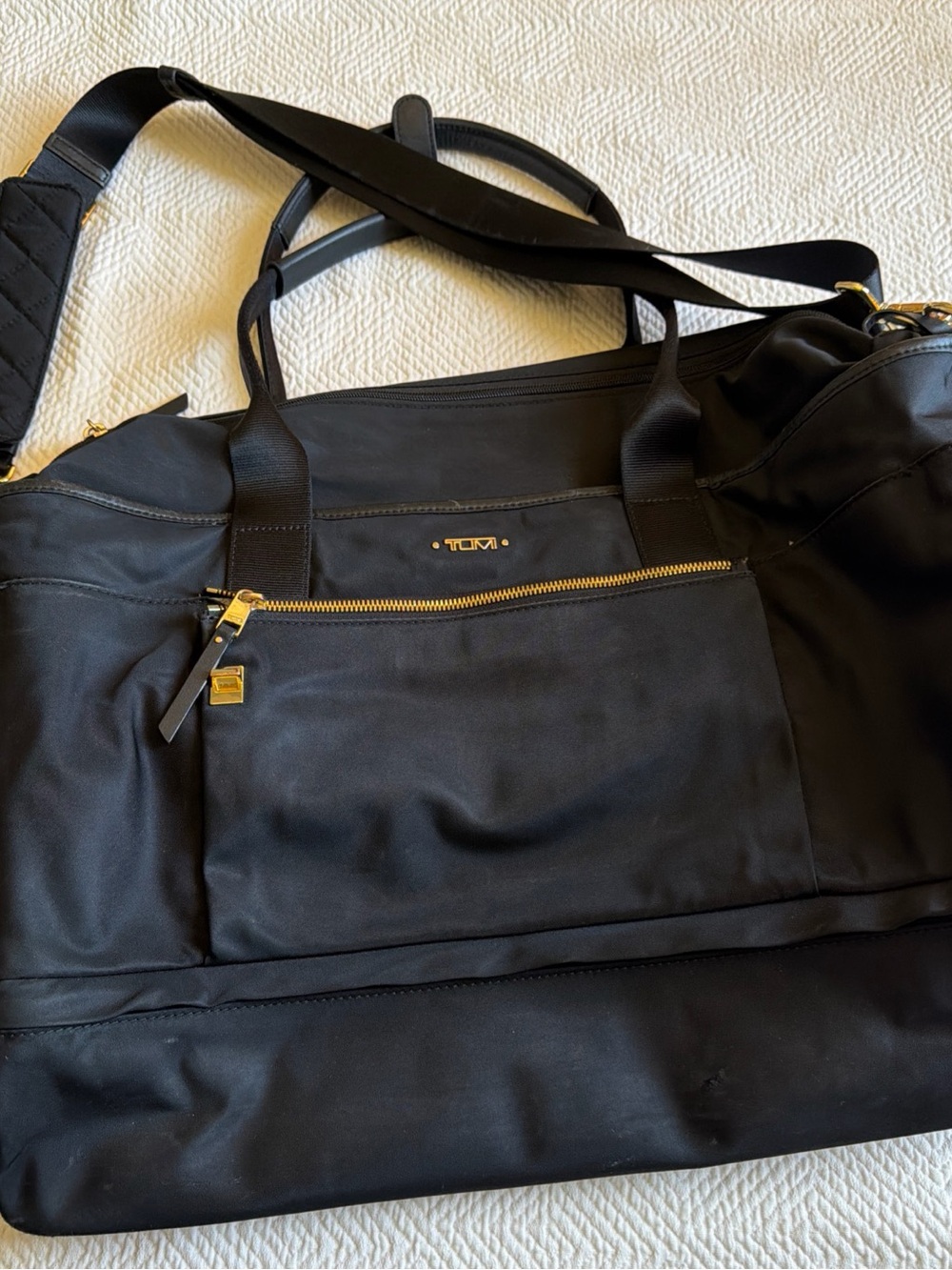 Tumi Black Duffel Bag with Gold Hardware